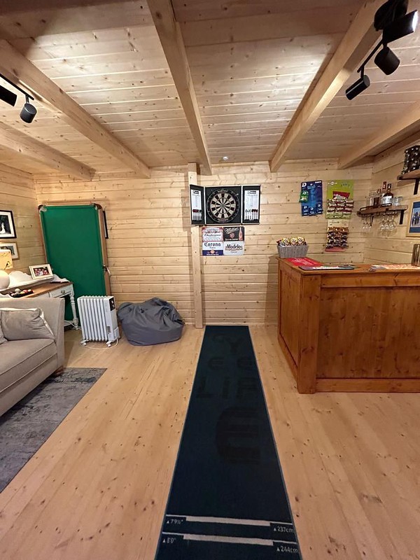 A summerhouse is a perfect p;lace to have a home bar and entertaining space