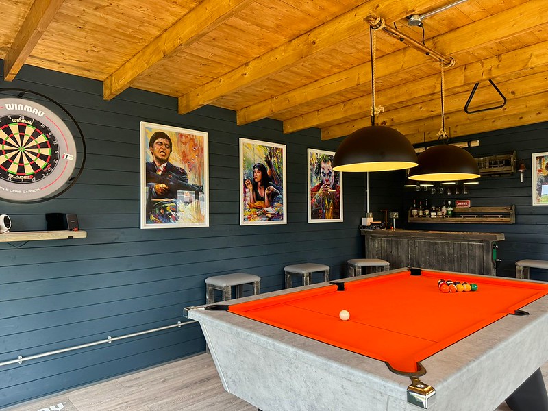 Cabins from Cabins Unlimited installed as a Pool Games Room and Bar